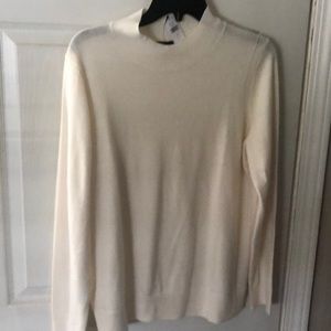Brand new, cream colored turtleneck